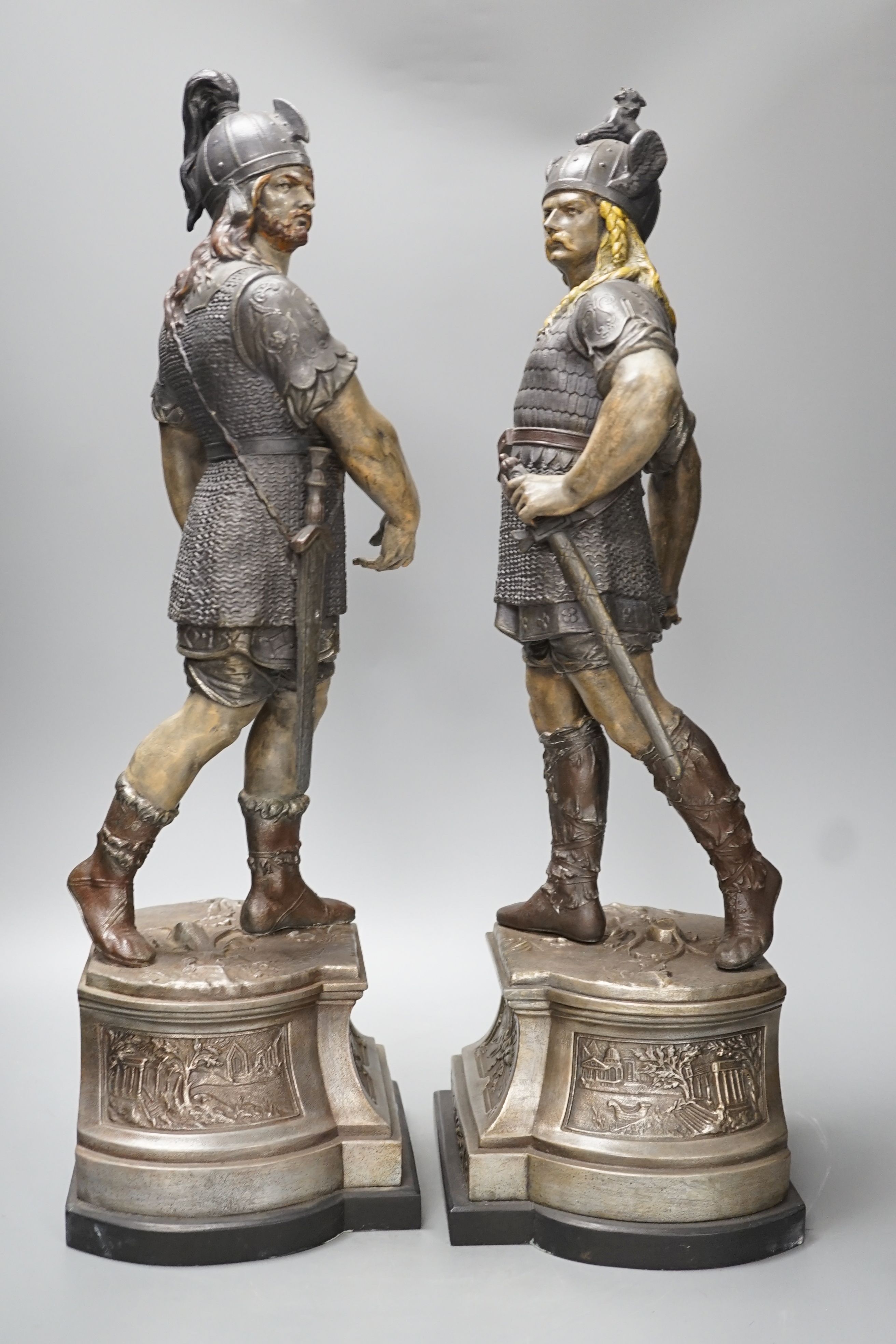 A pair of spelter figures of warriors - 54cm high